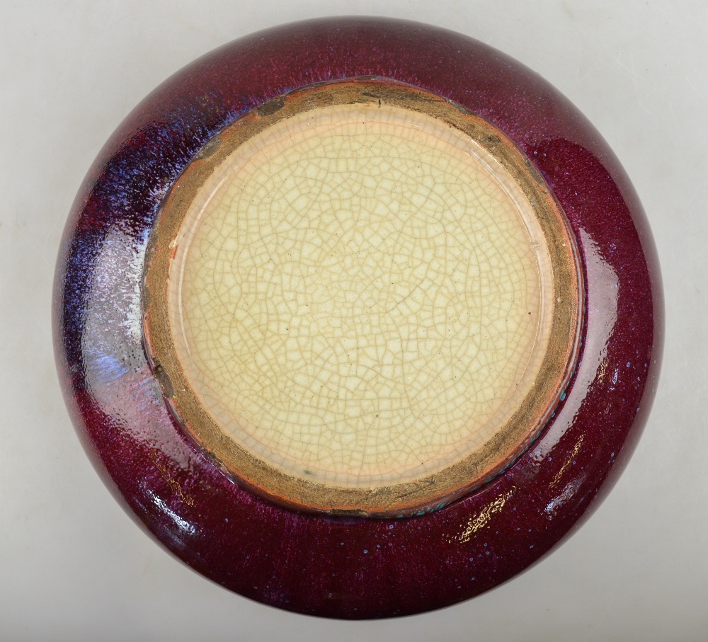 A 19th century Chinese sang de boeuf-glazed bowl with rolled rim, on shallow foot, 30 cm diam - Image 2 of 3