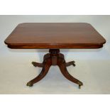 A Regency mahogany breakfast table by Gillows, the rectangular tilt top having rounded corners and