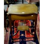 An Edwardian inlaid walnut work table wi