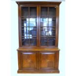 A small late 19th century oak bookcase h