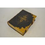 A Victorian Family Bible in embossed and