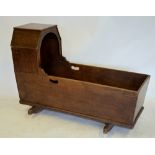An antique oak and elm canopied child's