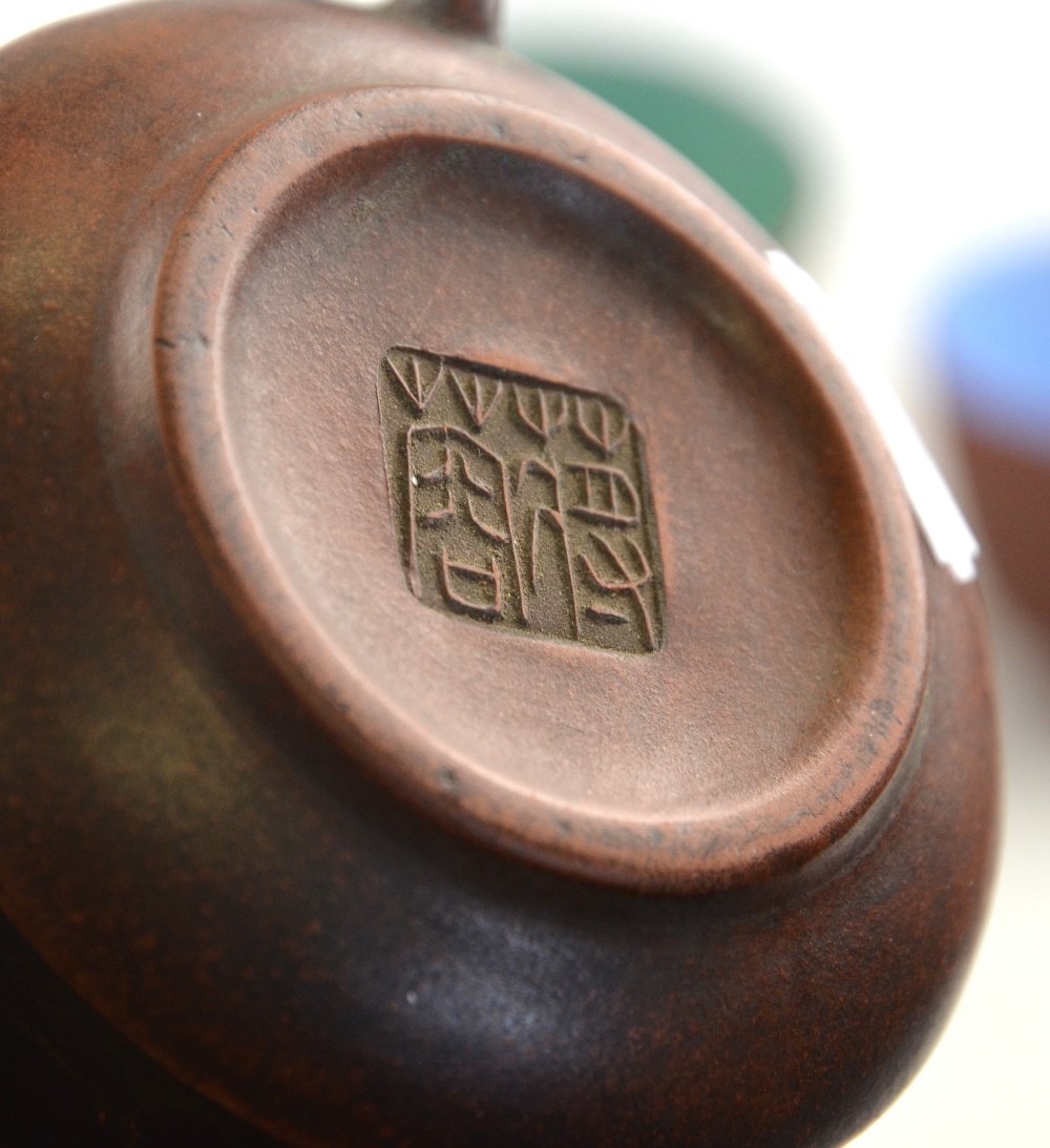 Three Yixing teapots, one incised with calligraphy to/w four tea bowls with glazed interiors (7) - Image 3 of 4