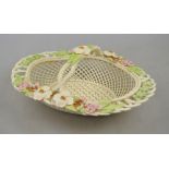 Belleek Degenhardt basket - An oval bowl in the form of a basket decorated in bold relief with