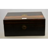 A Victorian coromandel writing box, the interior having a gilt tooled flocked writing surface and an