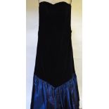 A vintage Laura Ashley black velvet strapless evening dress with blue taffeta skirt and large bow