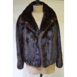 A dark brown mink box-shaped jacket with neat collar retailed by Louis Silverblatt,
