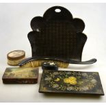 A Victorian papier mache table brush and pan,