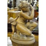 A 19th century Italian terracotta figure of Venus and Cupid, inscribed to base 'Venere Amore al