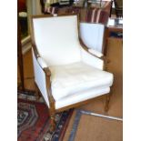 An oak framed French style salon armchair, upholstered in off-white linen,