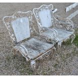 A pair of vintage wrought iron terrace armchairs, weathered,