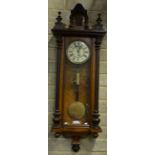 A late 19th century German kingwood and walnut 8-day regulator wall clock,