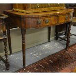 A George III mahogany bowfront side table, the deep top over a pair of frieze drawers,