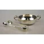 A silver taste-vin with scroll handle E. J. Gallichan & Co. Ltd.