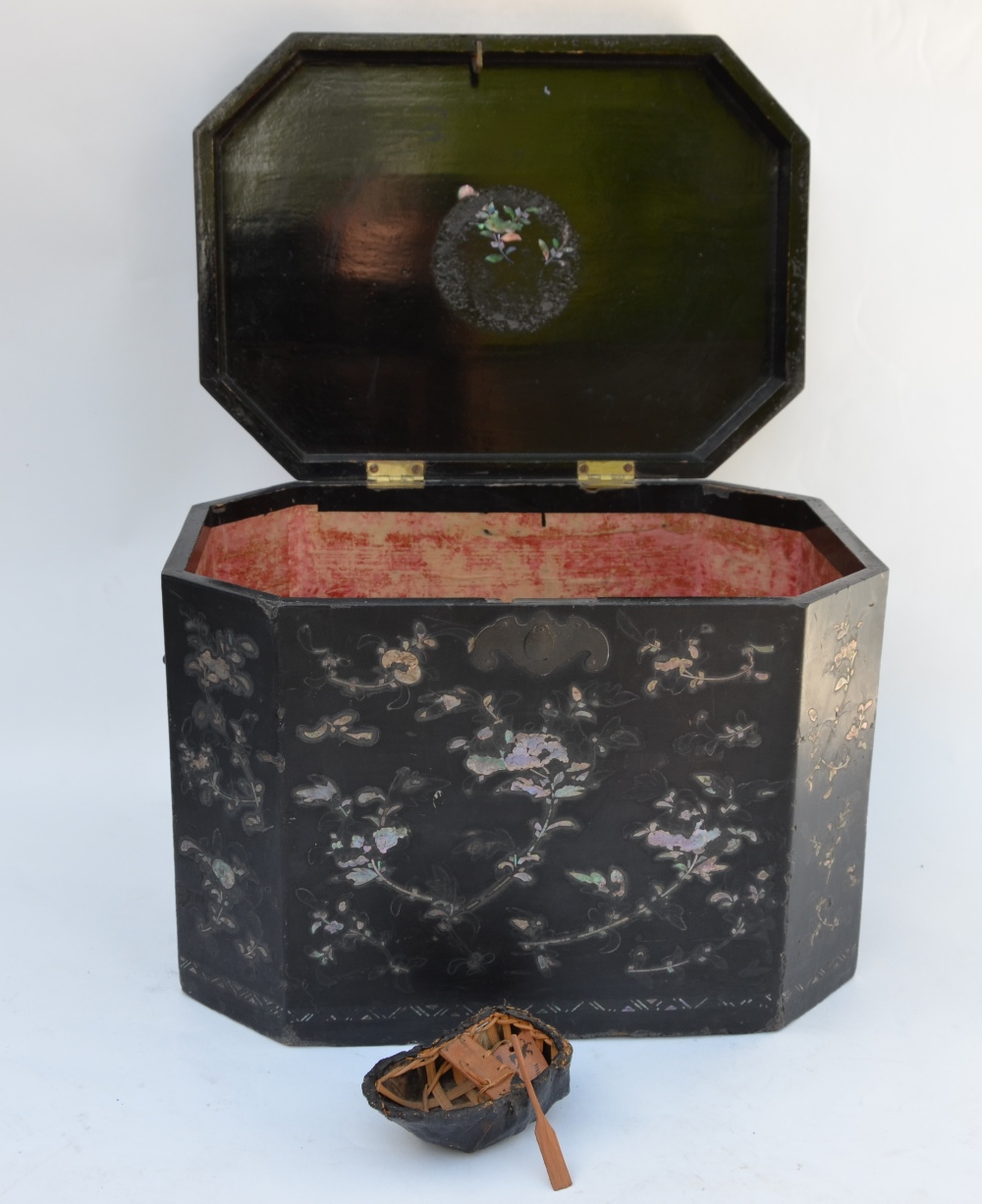 A Chinese 18th century black lacquer chamfered rectangular travelling box decorated in mother of