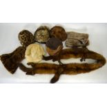 A fur tippet, two pairs of sheepskin fur gloves with lining, two ocelot printed fur hats,