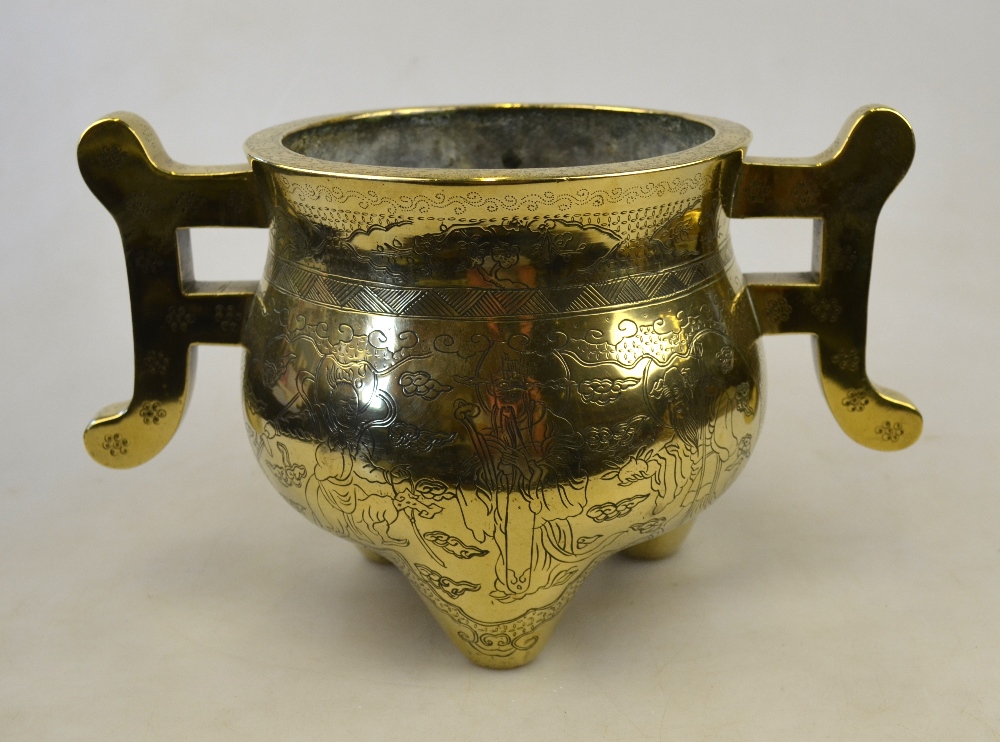 A Chinese polished bronze 19th century censer decorated with Shou Lao and other immortals, 16.5 cm