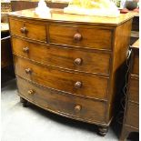 A Victorian mahogany bowfront chest of two short over three long graduated drawers retaining