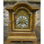 A continental eight-day walnut cased mantel clock,