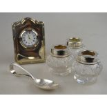 Three cut glass jars with silver collars, London 1923,