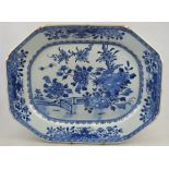 A Chinese Nanking blue and white chamfered rectangular meat dish, 18th century, decorated with