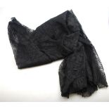 A black Malines lace skirt, to/w a piece of Malines lace,