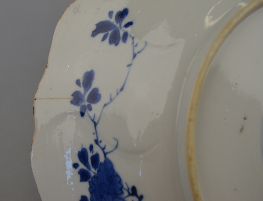 A Chinese blue and white moulded dish decorated with a bird perched on rockwork amidst flowers, - Image 3 of 3