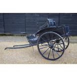 A Victorian horse-drawn cart in blue livery with deep-buttoned leather bench seat on leaf springs,