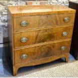 A 19th century mahogany chest of three long graduated drawers,