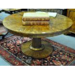 A good Regency figured mahogany breakfast table,