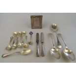 Three OEP silver tablespoons, nine various teaspoons and two tea knives with loaded silver handles