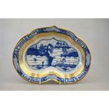 A Caughley 18th century blue and white kidney shaped dish painted with the 'Weir' pattern and having