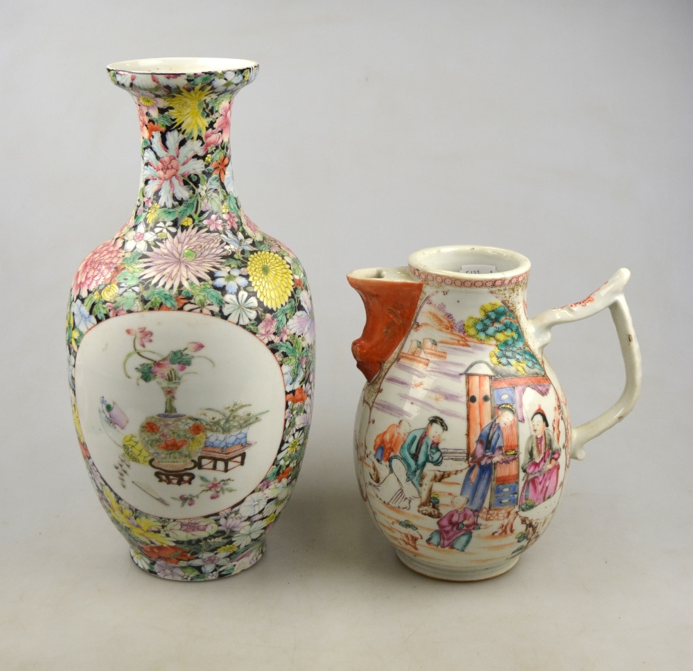 A Chinese millefiore vase decorated with two circular panels of polychrome vases of flowers,