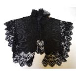 A Victorian black moire silk and beaded shoulder cape with lace edging and frilled silk georgette