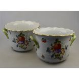 A pair of Herend cachepots decorated with fruit and flowers (2)