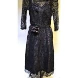 1940's black lace cocktail dress lined with mocha organza with belt and corsage, 46 cm across