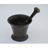 An antique bronze pestle and mortar,