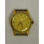 A gentleman's 9ct gold Longines wristwatch, the silvered dial with gilt hands and batons, 3 cm