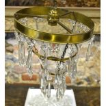 A brass three-tier ceiling light hung with faceted lustre drops Condition Report Not collated - some