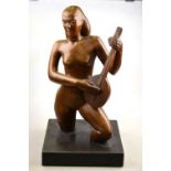Spanish School, 1930's (by repute), a carved wood female nude with mandolin, unsigned, 36 cm,
