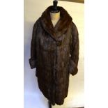 A dark brown squirrel fur coat,