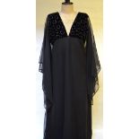 Quad 1970's black chiffon evening dress with batwing sleeves and velvet sequinned bodice (size 14)