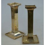 A pair of proto-Art Deco loaded silver candlesticks with square pillars, A & J Zimmerman, Birmingham