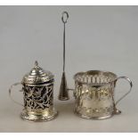 An early 19th century Dutch pierced silver drum mustard with hinged cover,