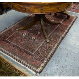 An old Turkish rug, geometric design on pale red ground, 1.93 x 1.20 m Condition Report Even overall