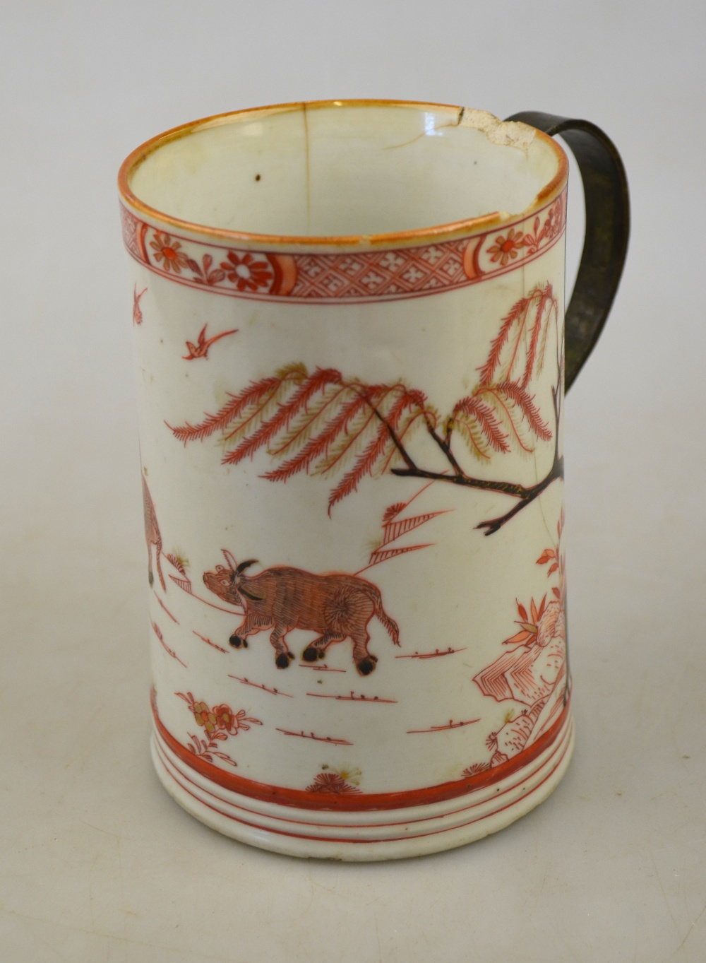 A Chinese Imari tankard decorated with a boy and water buffalo in a rocky landscape with pine - Image 2 of 4