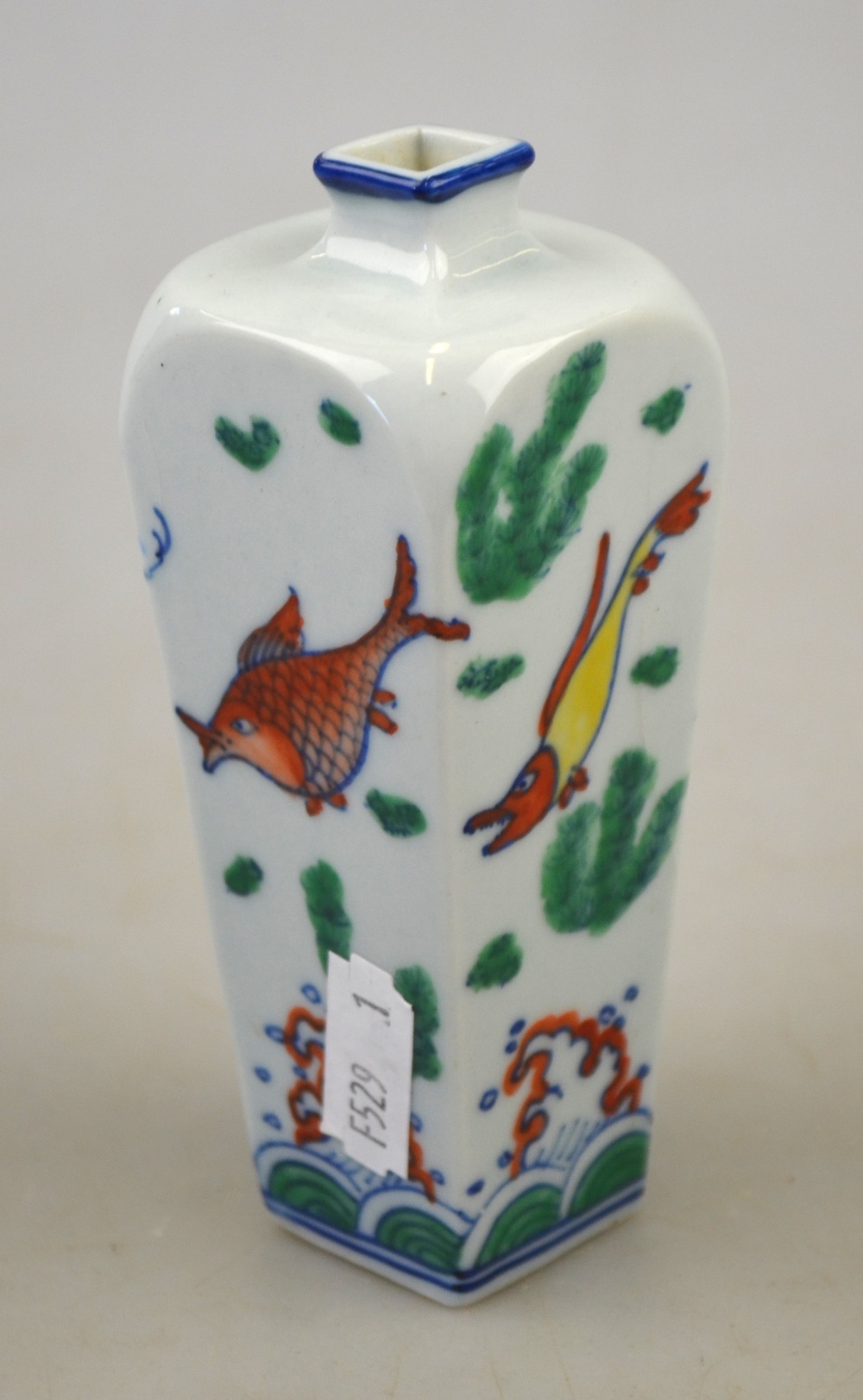 A Chinese Doucai small square vase decorated with fish and crustaceans, 11 cm, to/w a Japanese - Image 3 of 4