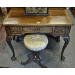 An 18th century mahogany, oak and rosewood side table having a cross-banded shaped top over three