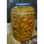 A large Chinese stoneware storage jar moulded with panels of animals, 20th century, 74 cm h.