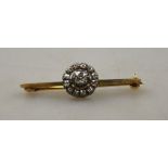 A Victorian bar brooch circular diamond set cluster having square old cut diamond in centre,